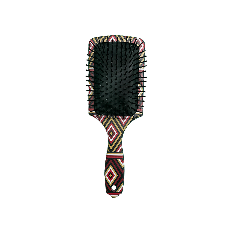 African Ndebele print hair brush with bold geometric pattern and smooth bristles.