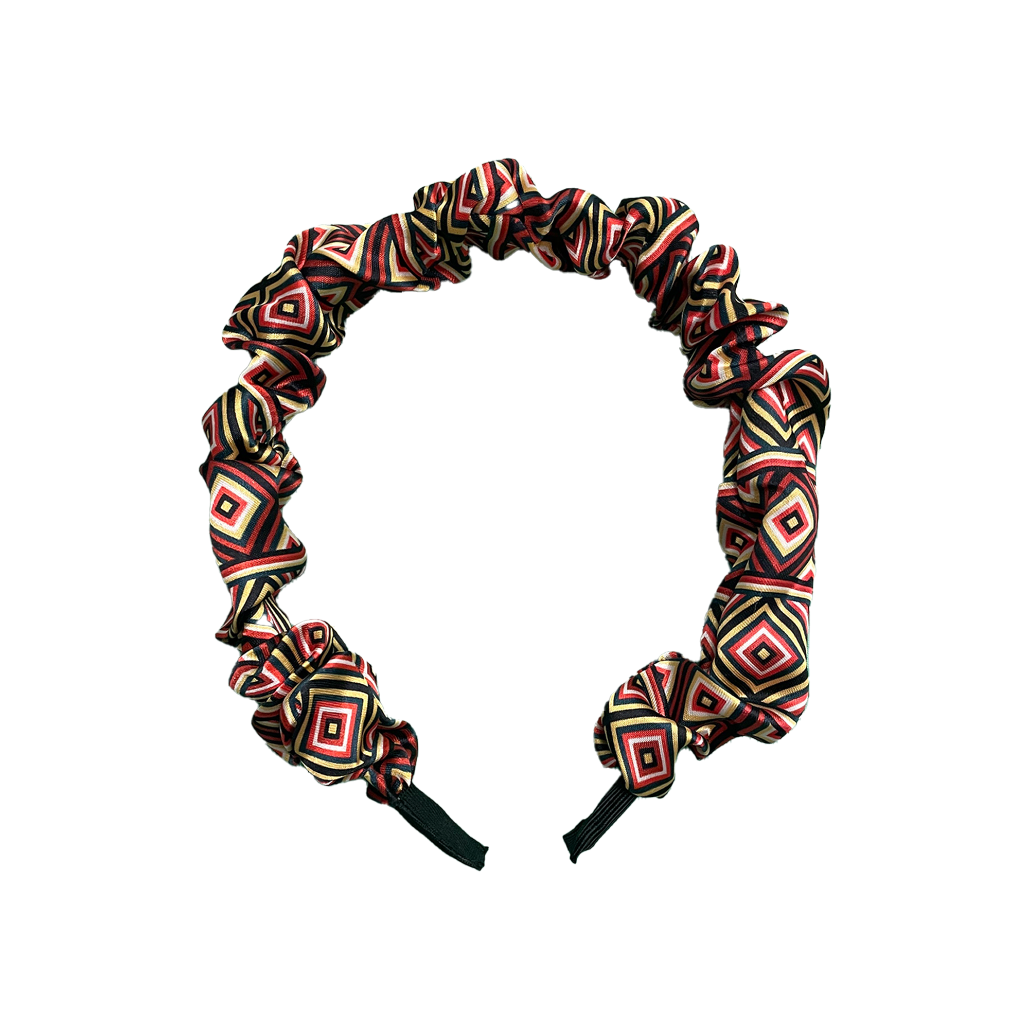 African Ndebele print ruched headband with bold geometric pattern and soft fabric design.