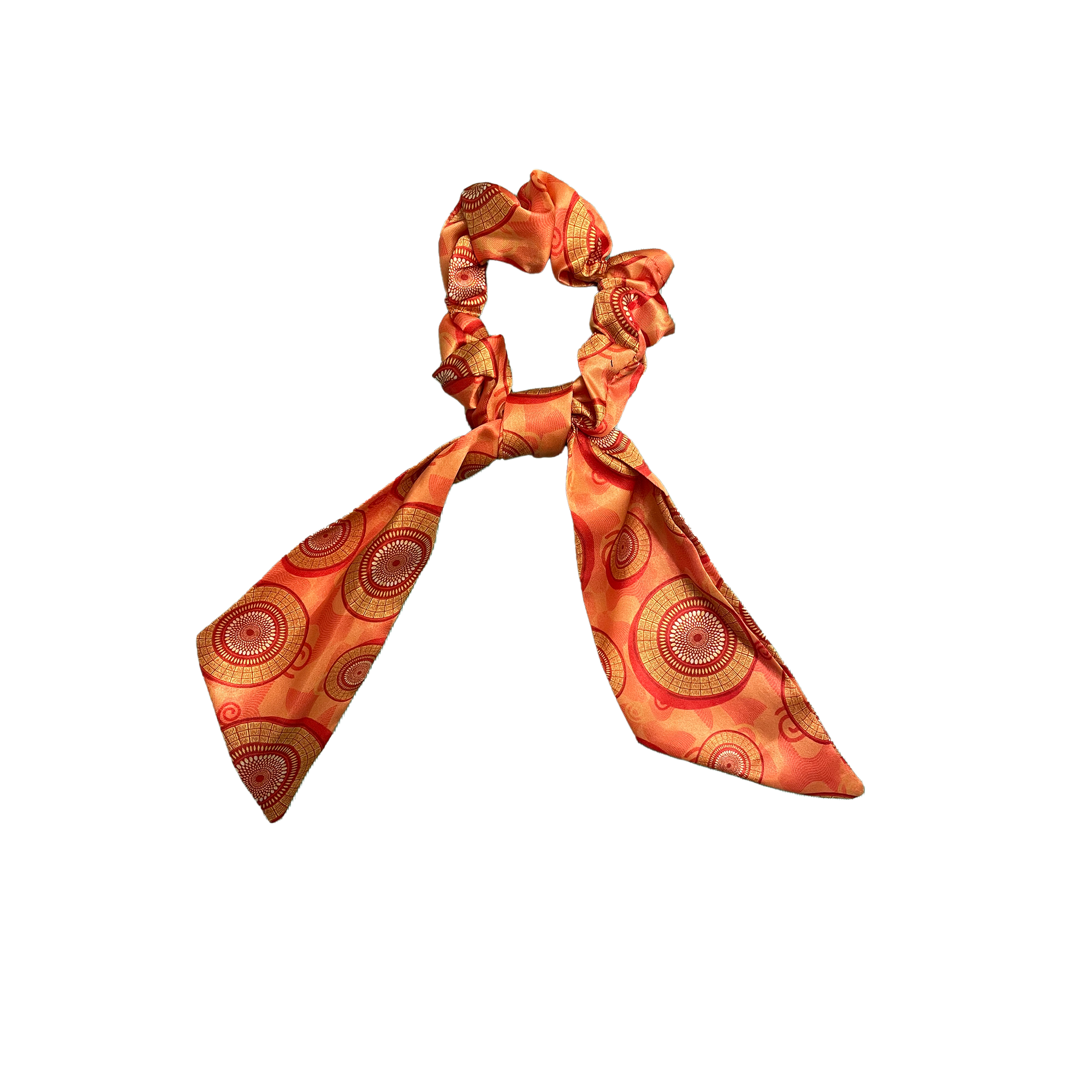 African Zulu print bow scrunchie with colorful beadwork-inspired pattern and flowing bow.
