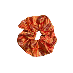 African Zulu print scrunchie with colorful beadwork-inspired pattern and soft elastic fabric.